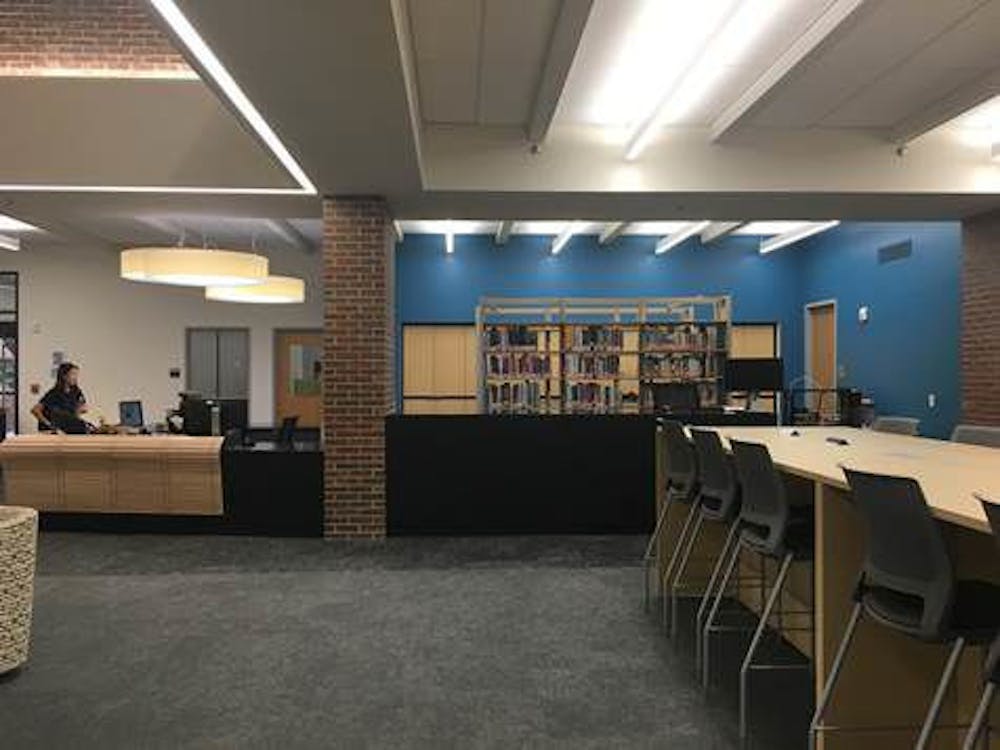 <p>The UF Education Library's circulation desk after the renovation</p>