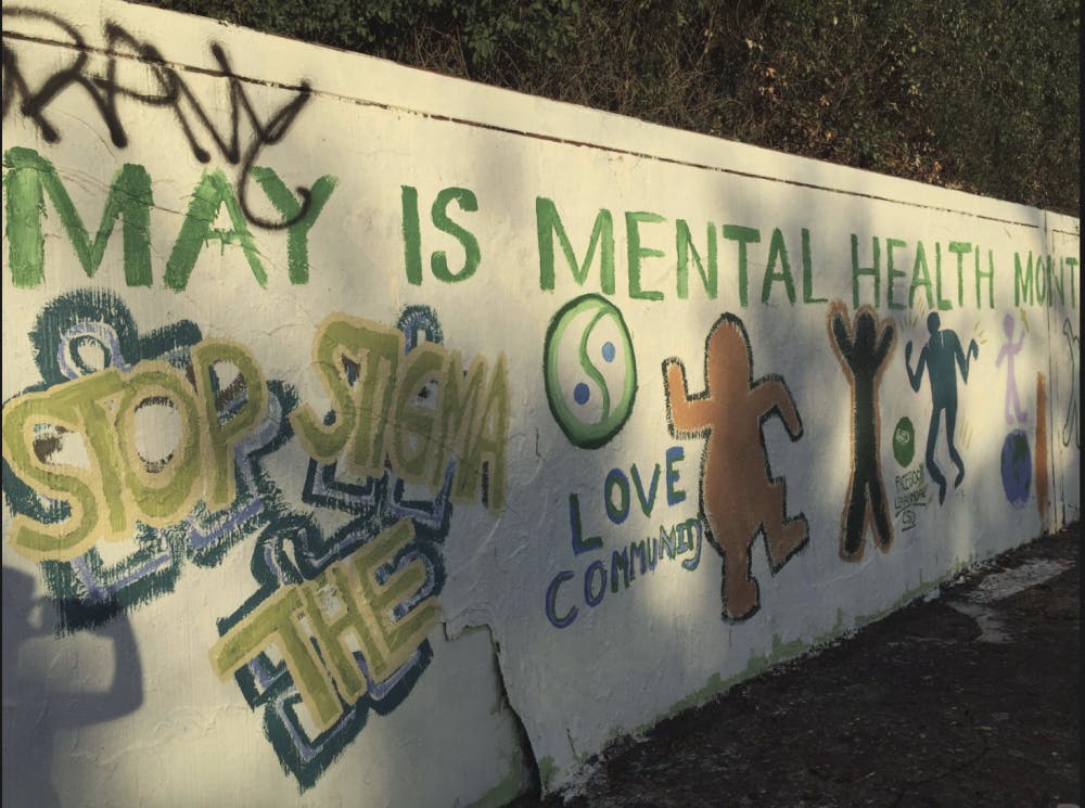 A mural painted on the 34th Street Wall in May 2017 in honor of Mental Health Awareness Month by local group AnARTists signifies the organization’s belief that “Art Heals.” One of the organization’s goals is to stop the stigma behind mental illness.
