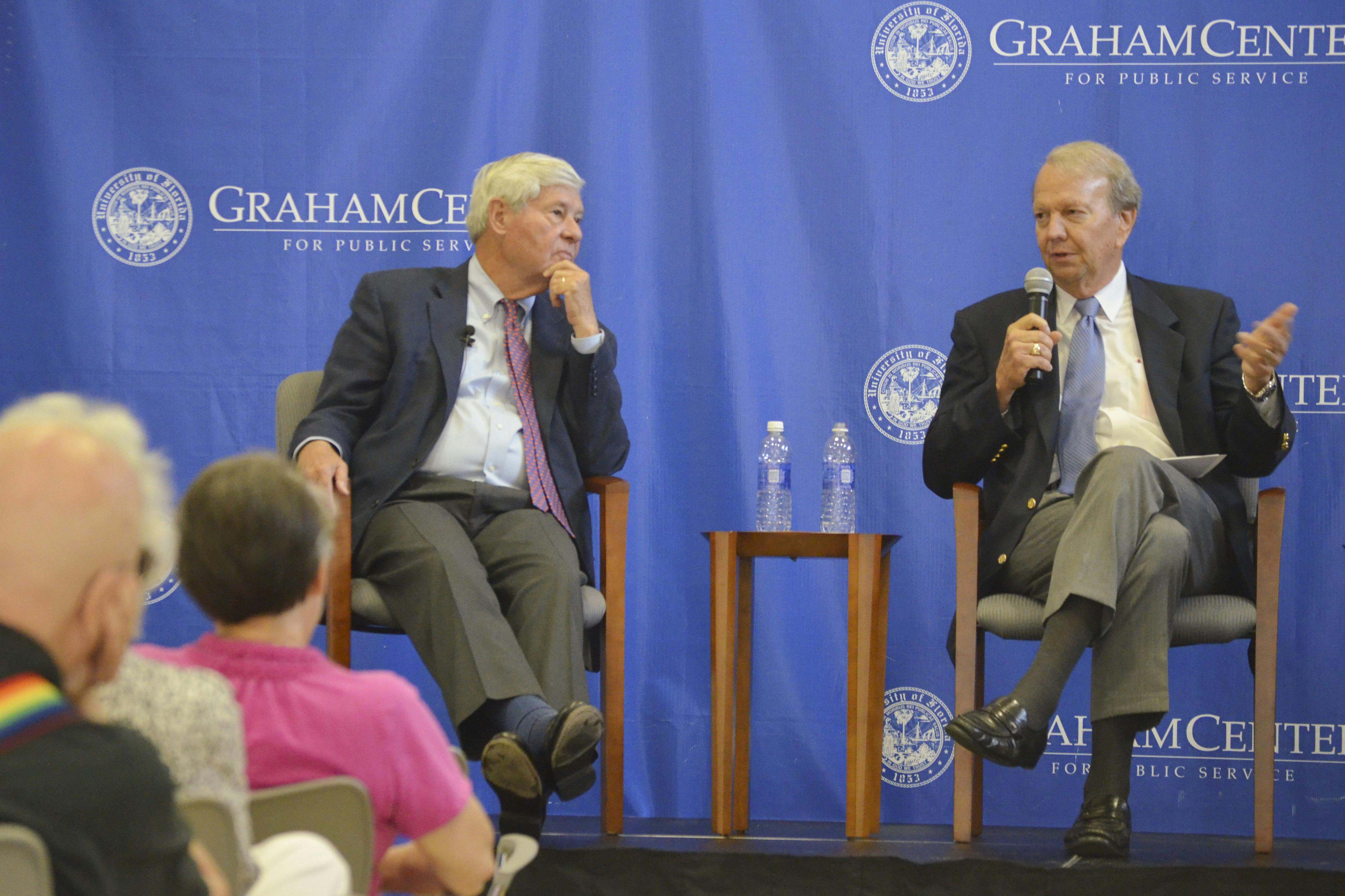 Former U.S. Sen. Bob Graham listens as Jon Mills, dean emeritus of the Levin College of Law, reads a question from the audience Thursday night at the Bob Graham Center for Public Service.