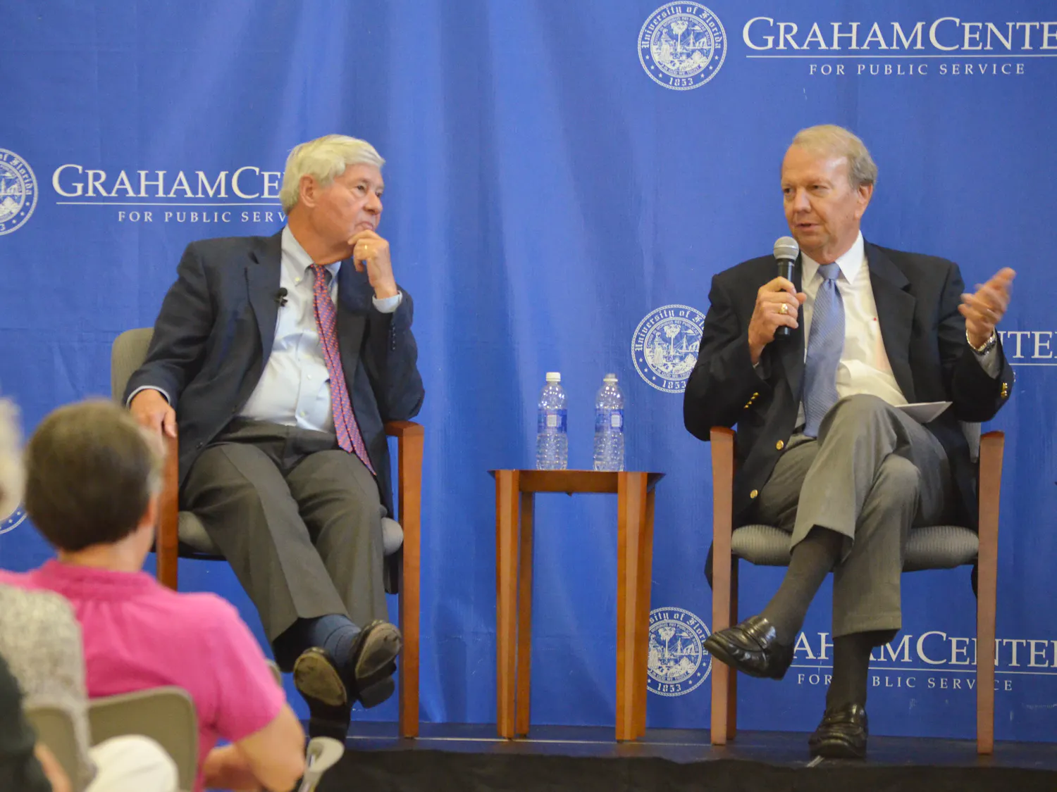 Former U.S. Sen. Bob Graham listens as Jon Mills, dean emeritus of the Levin College of Law, reads a question from the audience Thursday night at the Bob Graham Center for Public Service.
