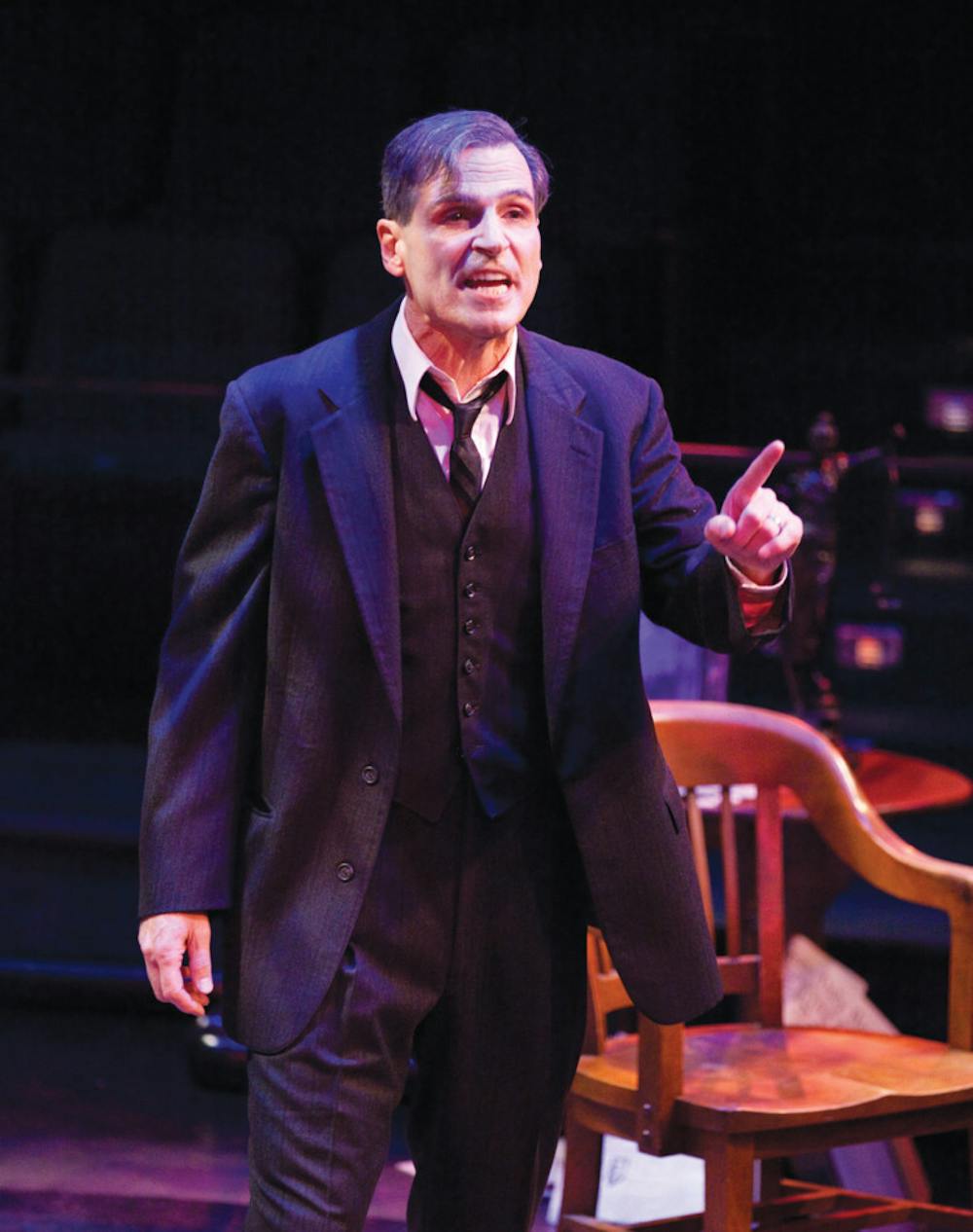 <p>Paul Morella, playing Clarence Darrow, looks at a temporary jury of audience members at the Hippodrome State Theatre on Monday night.</p>