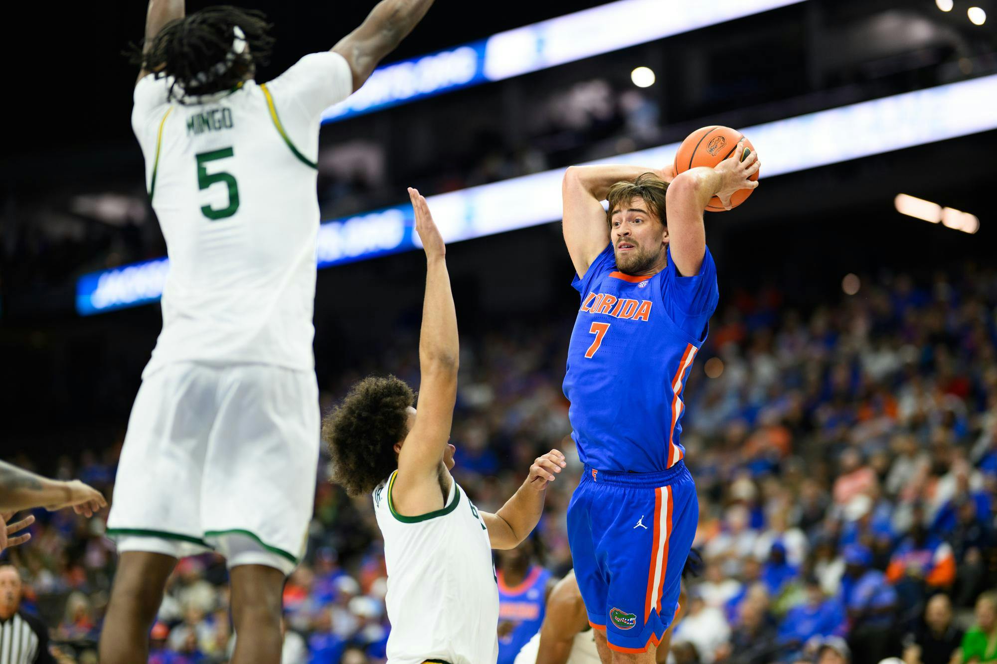Florida guard Urban Klavzar (7) throws across the court during the first half of an NCAA men's basketball exhibition game against Baylor, Sunday, Oct. 18, 2026, in Jacksonville, Fla.