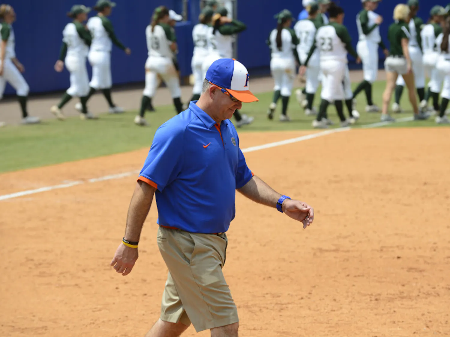 Tim Walton walks off the field after Florida's 2-0 win against USF on May 19 at Katie Seashole Pressly Stadium. Against Tennessee on Thursday, Florida allowed nine runs - its most to an opponent this year.