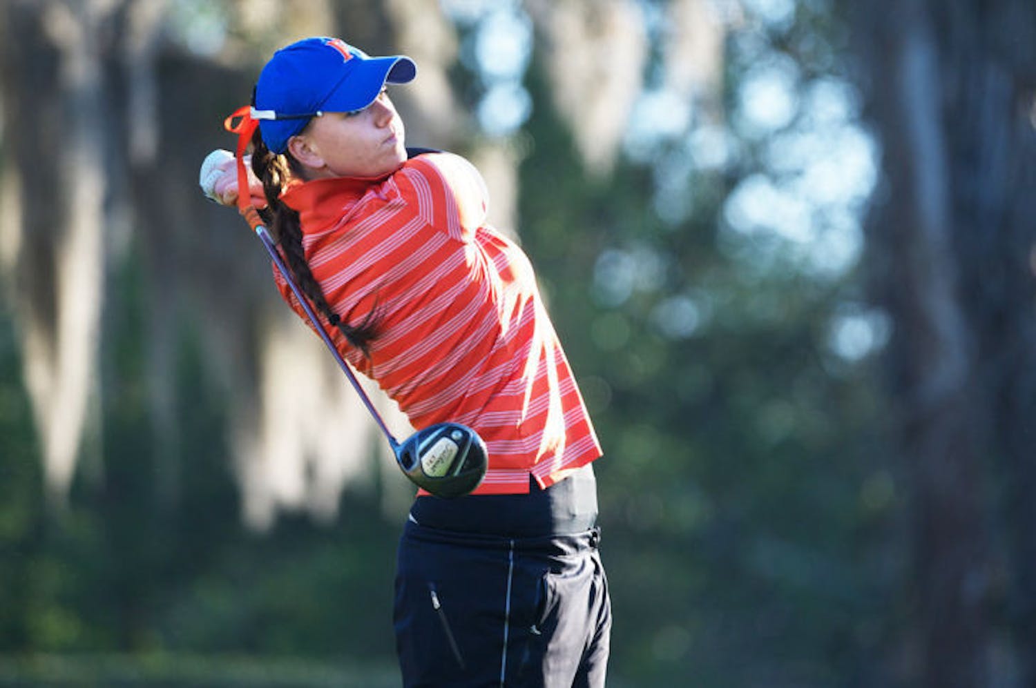 Junior Camilla Hedberg watches her shot during the SunTrust Gator Invitational on March 15 at Mark Bostick Golf Course.&nbsp;
