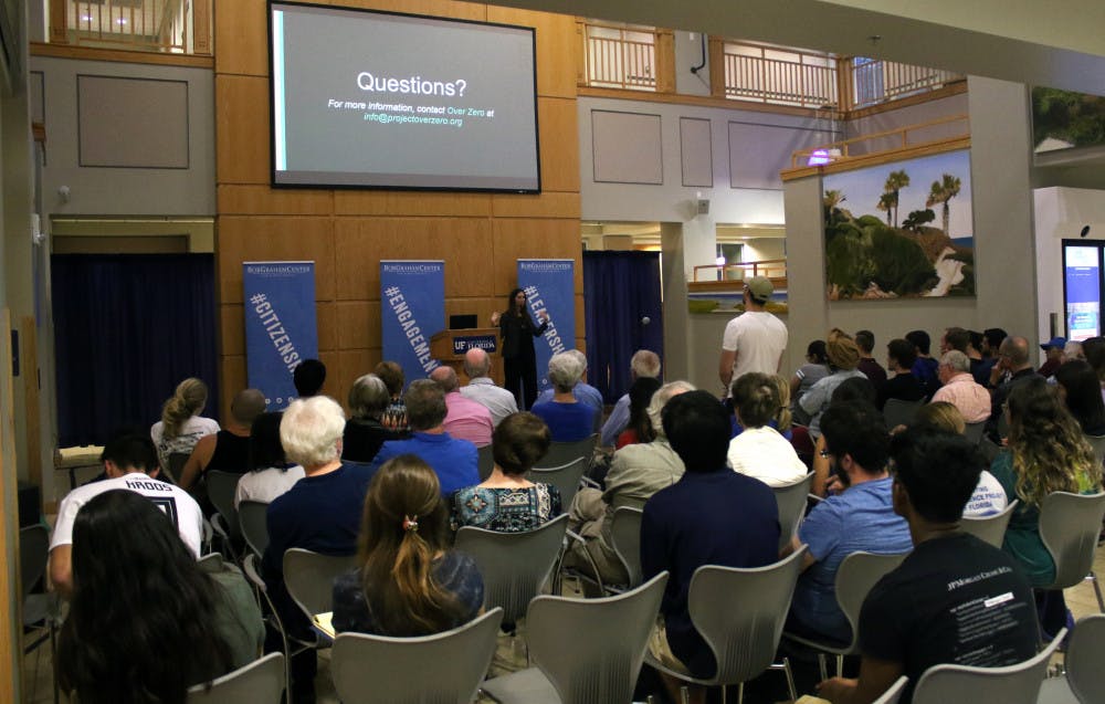 Rachel Brown, 30,  answers questions from students after concluding her talk on how to combat hate speech in the Pugh Hall Ocora at the University of Florida Tuesday night.      