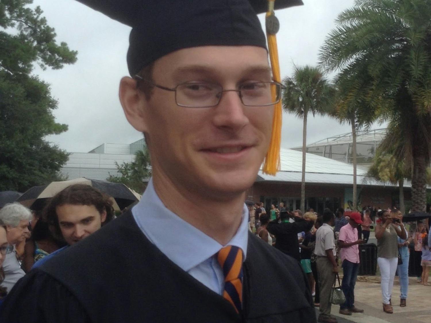 Thomas Anderson graduates from UF with three bachelor’s degrees in 2017.
