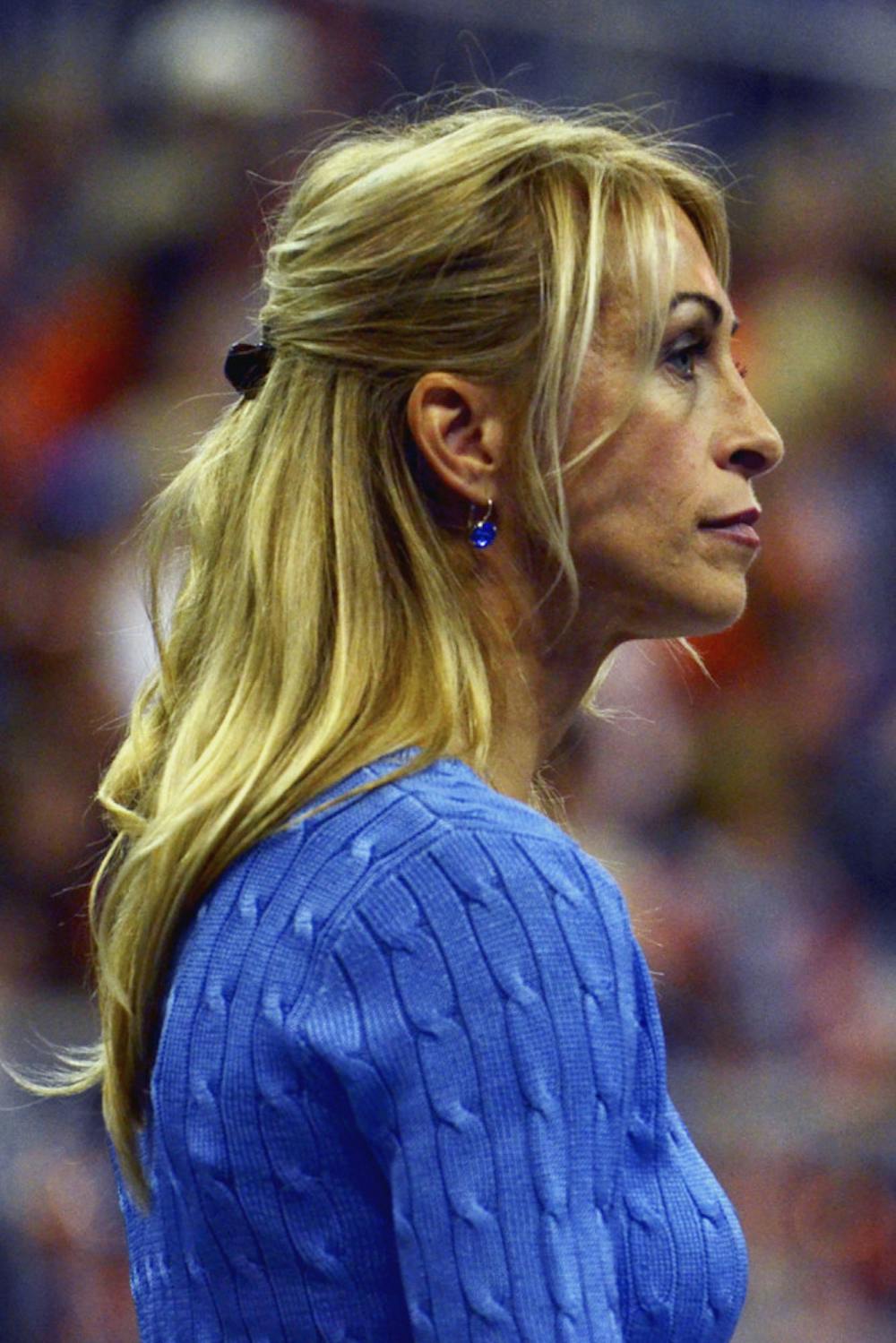 <p>Rhonda Faehn watches her teammates compete during Florida's win against Georgia on Jan. 30.</p>