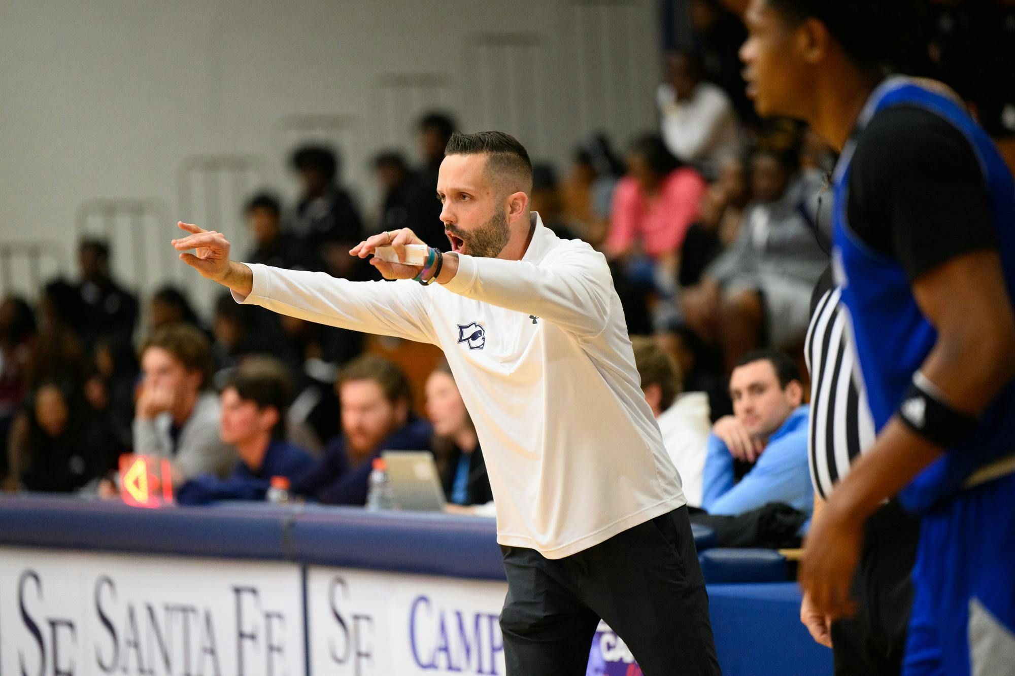 Santa Fe College head coach John Ritzdorf coaches his team during an NJCAA men's basketball game against Miami Dade College in Gainesville, Fla., Saturday, Jan. 19, 2026.