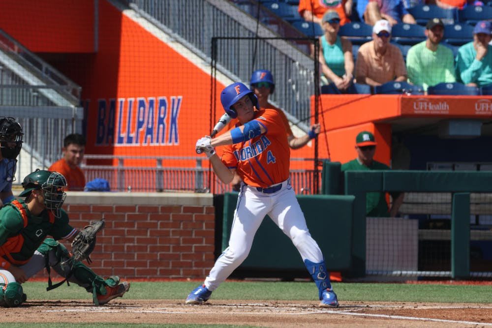 Florida second baseman Cade Kurland swings his bat in the Gators' 14-4 win against the Miami Hurricanes Sunday, March 5, 2023.
