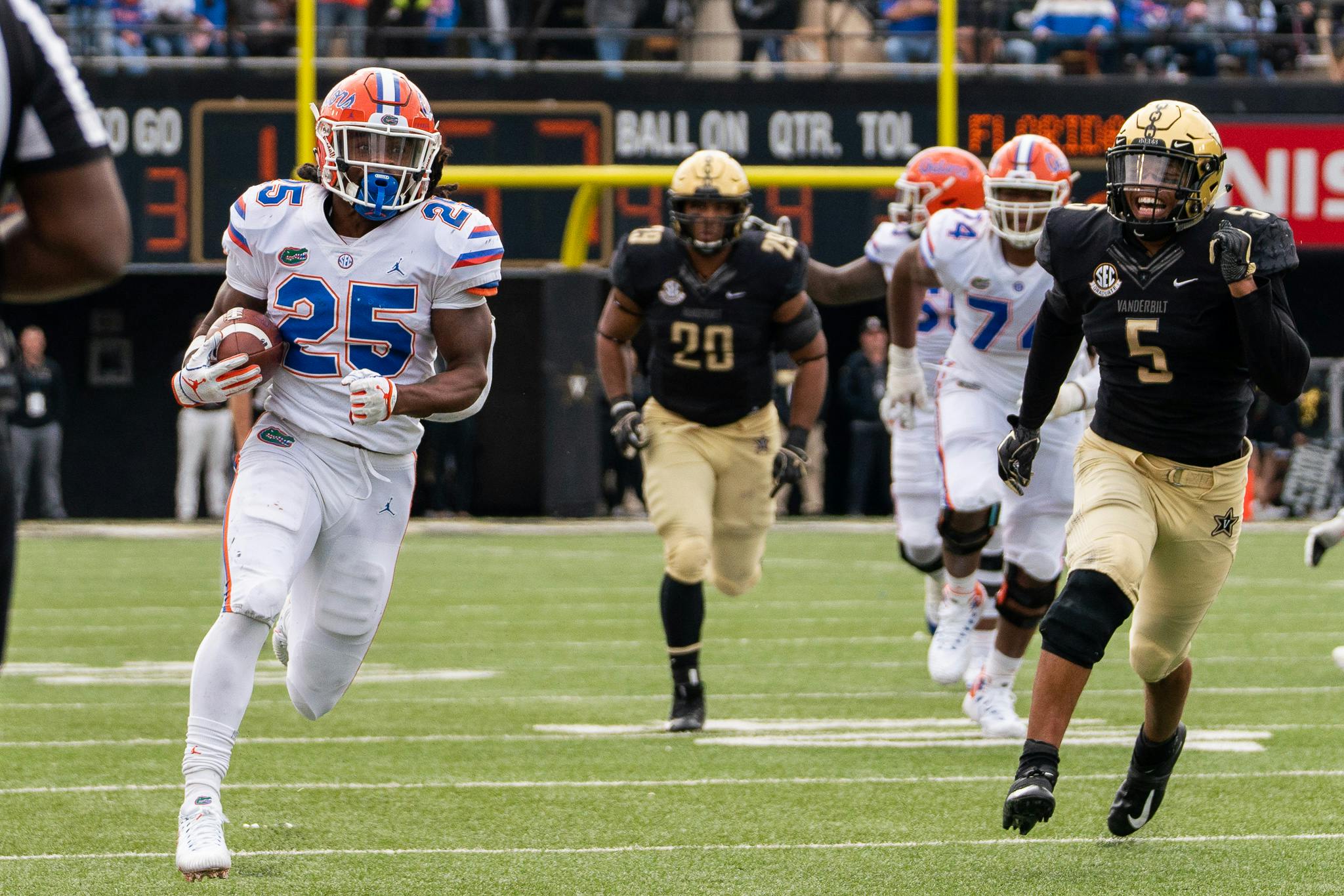 Running back Jordan Scarlett (25) rushed for 113 yards and a touchdown in Saturday's 37-27 win over Vanderbilt.