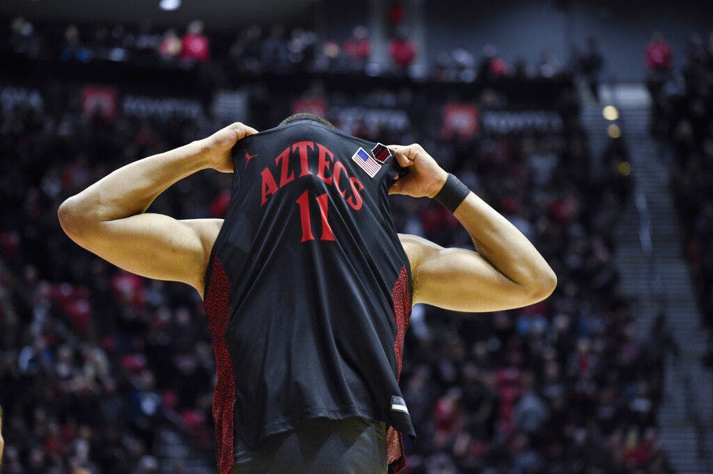 San Diego State forward Matt Mitchell (11) reacts after missing the final basket during the second half of an NCAA college basketball game against UNLV, Saturday, Feb. 22, 2020, in San Diego. (AP Photo/Denis Poroy)