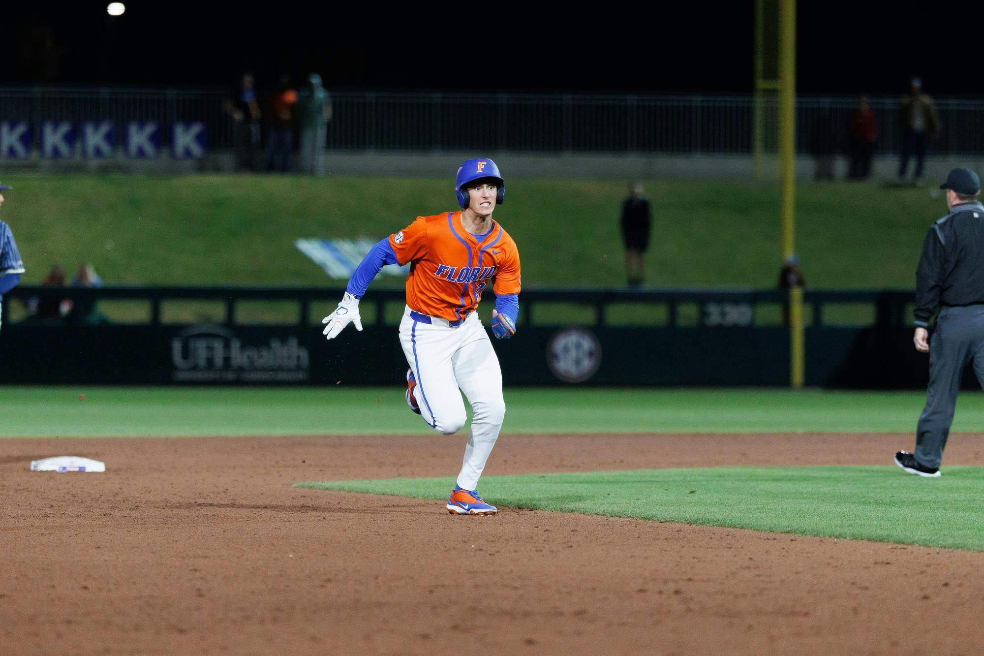 Florida outfielder Cash Strayer (26) runs to third base during an NCAA baseball game against Florida International University, Wednesday, Feb. 25, 2026, in Gainesville, Fla.