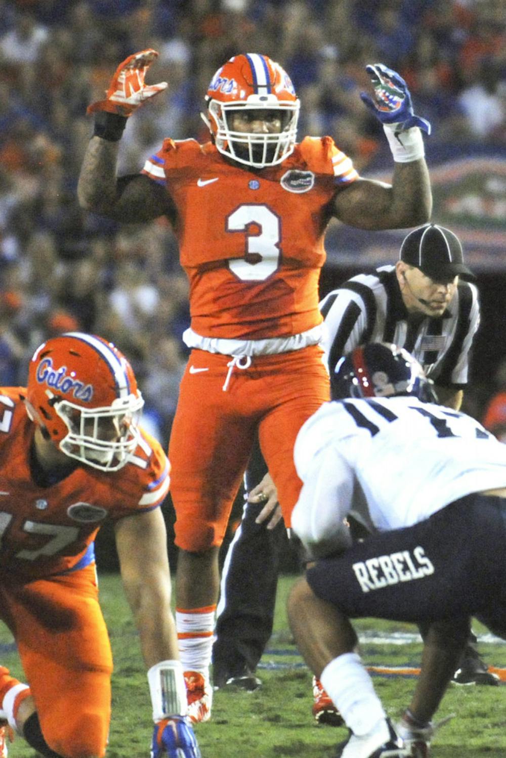 <p>Linebacker Antonio Morrison pumps up the crowd during Florida's 38-10 win against Ole Miss on Oct. 3, 2015, at Ben Hill Griffin Stadium.</p>