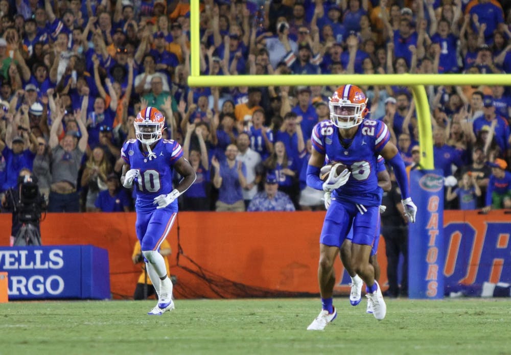 Sophomore cornerback Devin Moore returns his first career interception in the Florida Gators' 29-16 win against the No. 11 Tennessee Volunteers Saturday, Sept. 16, 2023.