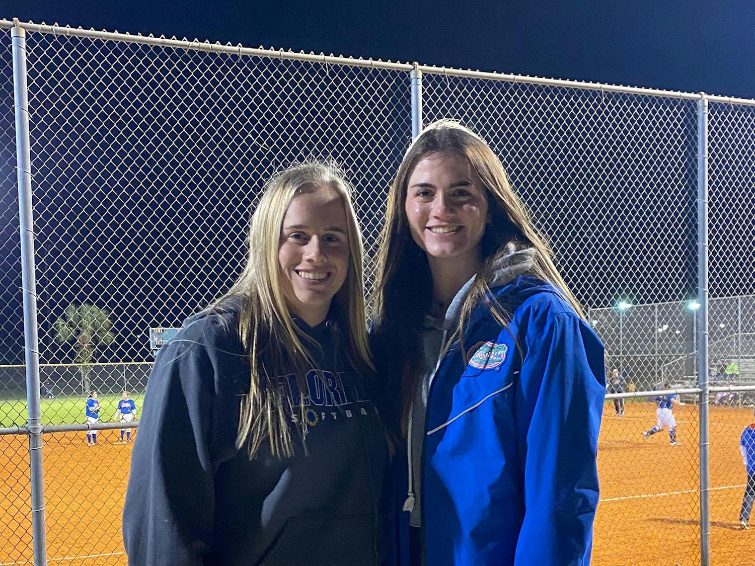 Kinsey, left, stands next to her sister Avery, right.