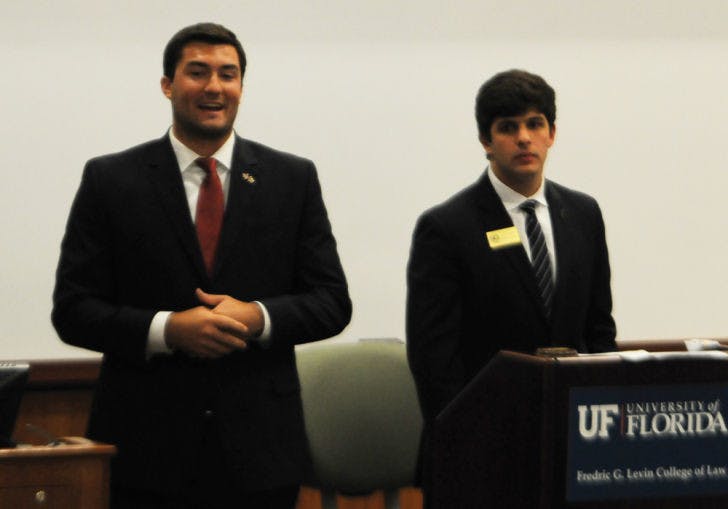 Sen. Davis Bean, left, and Senate President Cory Yeffet speak at Tuesday night’s Student Senate meeting. Bean was appointed chair of the Allocations Committee.