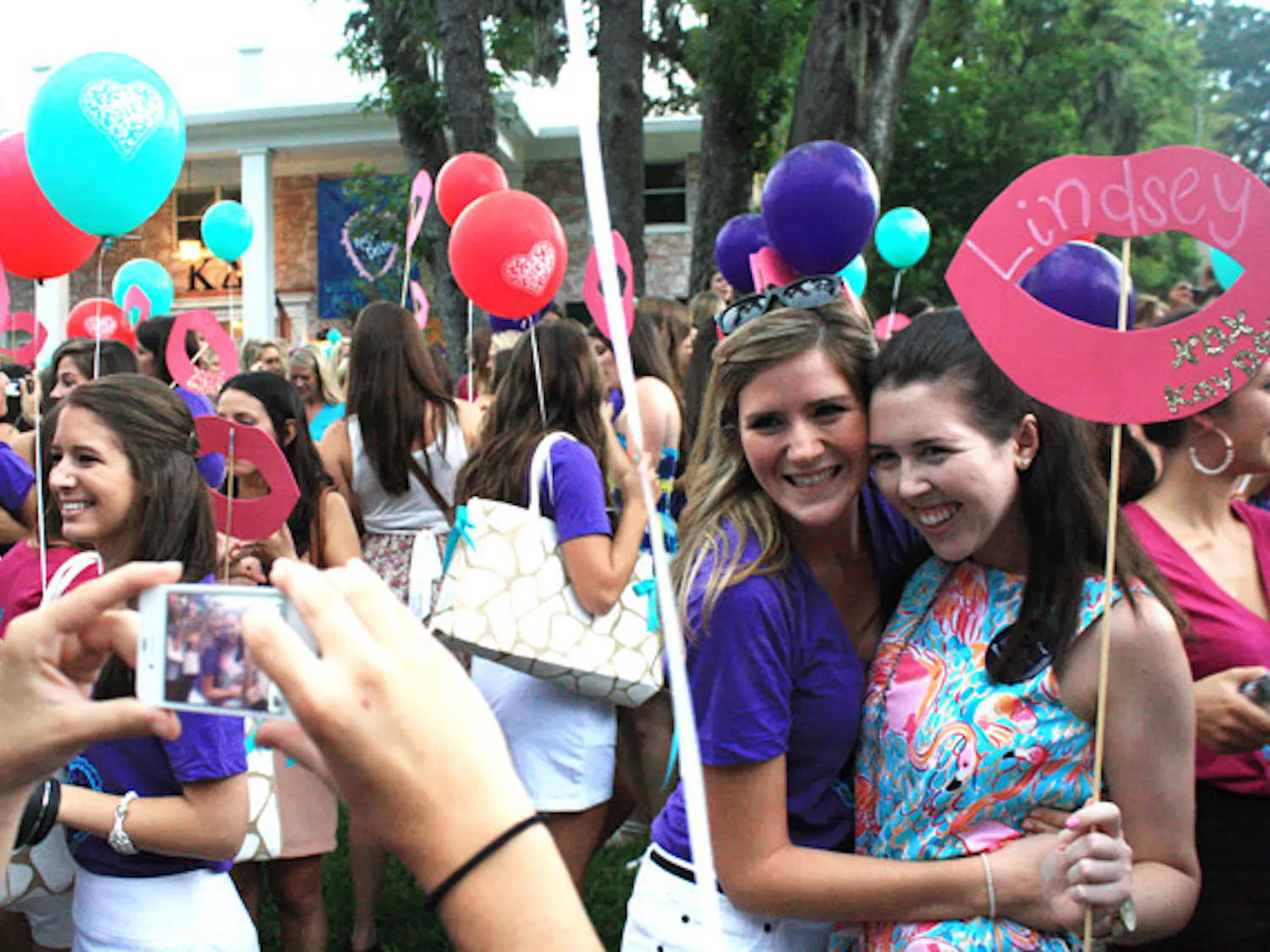 Kappa Delta pledges meet their new sisters in front of their sorority house on Tuesday evening. About 1,500 women joined the 2011 pledge class for the 16 chapters of sororities on the UF campus.