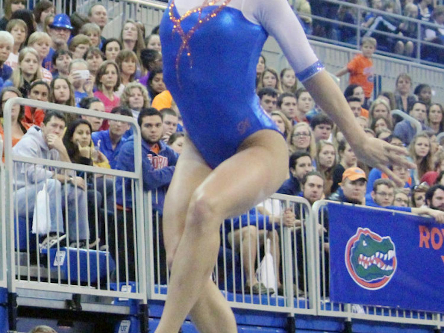 Alaina Johnson performs a beam routine during Florida’s win against Oklahoma on Jan. 31 in the O’Connell Center.