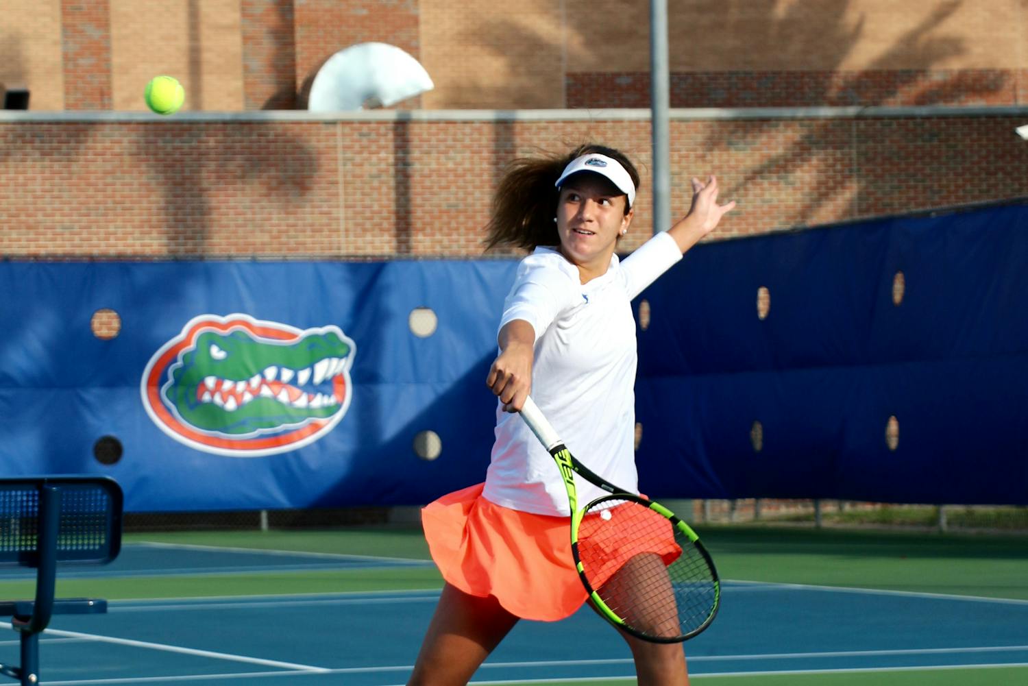 Anna Danilina returns a backhand during Florida's 4-2 win against Oklahoma State on Feb. 18, 2017, at the Ring Tennis Complex.