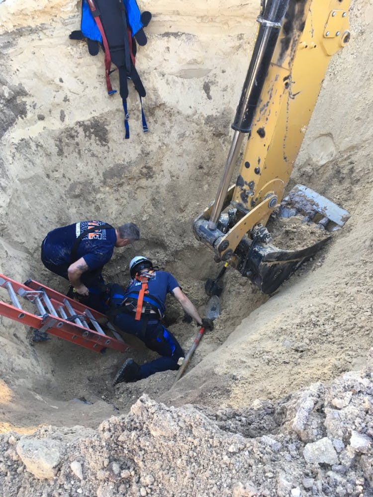 Gainesville Fire Rescue saved a construction worker who was trapped underneath one-to-two feet of dirt at the Malcolm Randall Veterans Affairs Medical Center Thursday morning. Courtesy to The Alligator