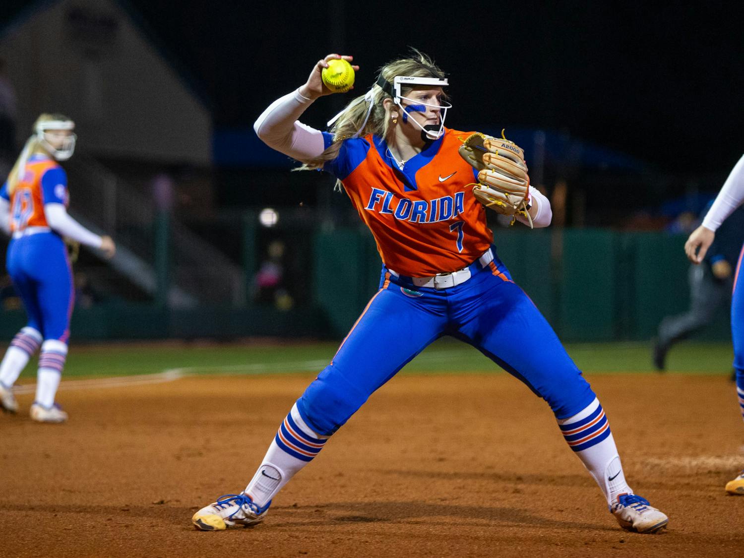Florida softball freshman pitcher Keagan Rothrock fields a ball in the Gators' 3-0 loss to the Oklahoma State Cowgirls on Monday, February 19, 2024. 