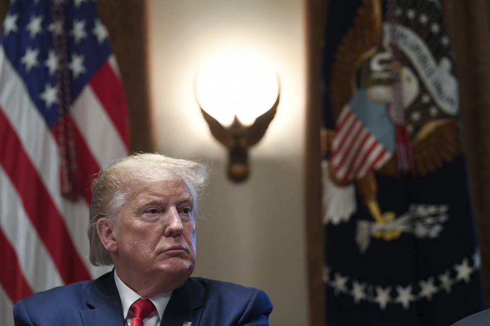<p>President Donald Trump listens during a meeting in the Cabinet Room of the White House in Washington, Friday, Nov. 22, 2019, on youth vaping and the electronic cigarette epidemic. (AP Photo/Susan Walsh)</p>