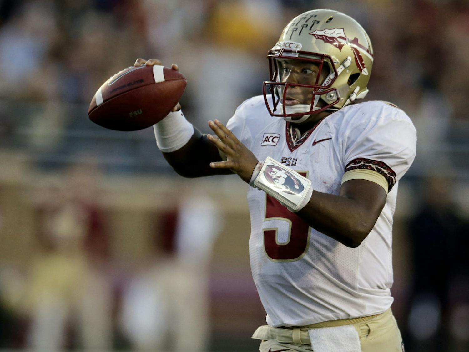 Florida State quarterback Jameis Winston (5) throws a pass during the second half of FSU's 48-34 win at Boston College on Sept. 28.