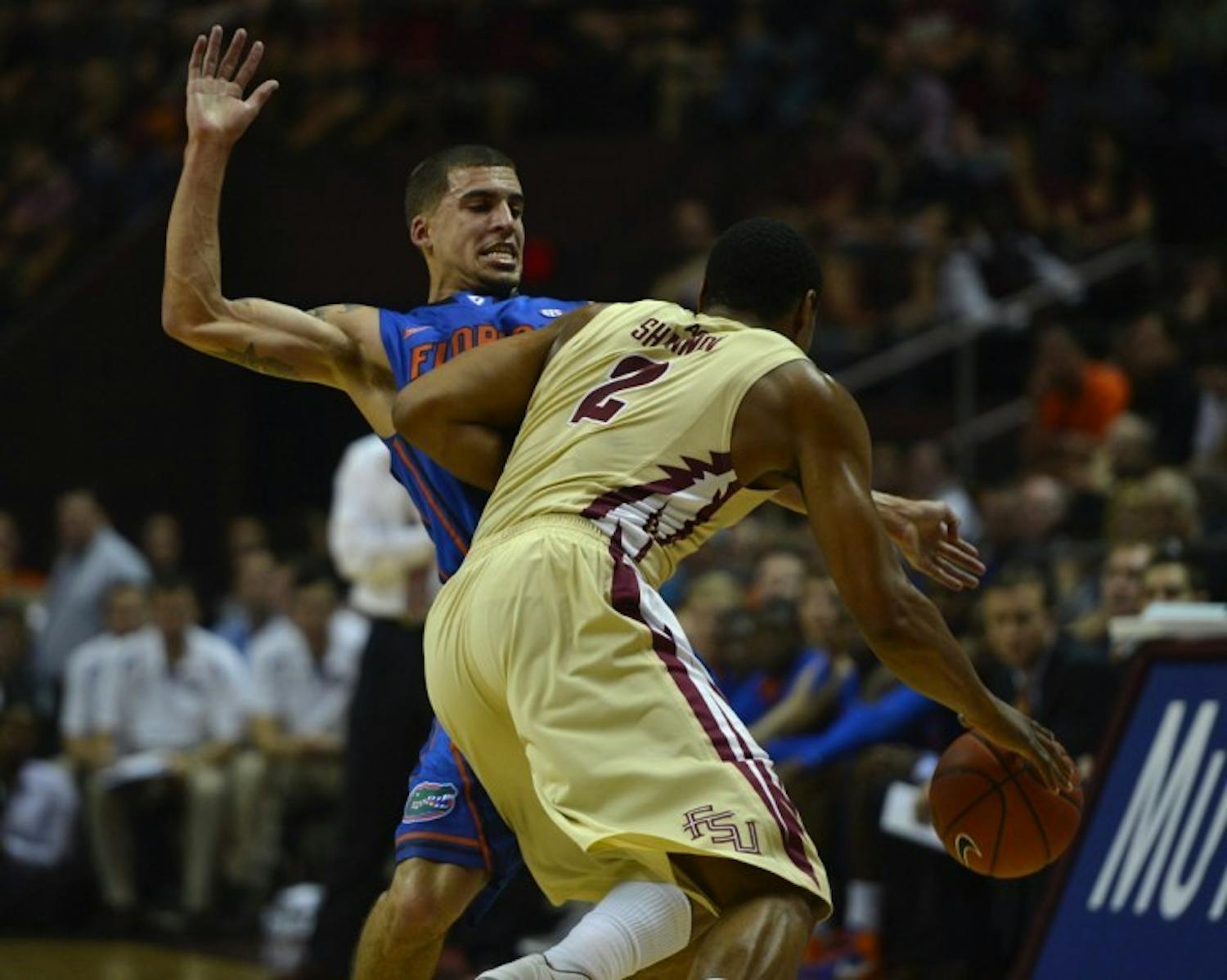 Junior guard Scottie Wilbekin blocks Florida State forward Terrance Shannon during Florida's 72-47 win against Florida State in Tallahassee on Wednesday, Dec. 5, 2012.