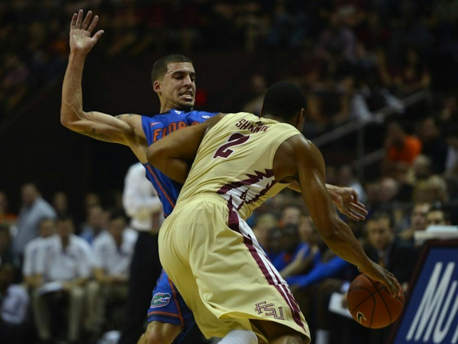 Junior guard Scottie Wilbekin blocks Florida State forward Terrance Shannon during Florida's 72-47 win against Florida State in Tallahassee on Wednesday, Dec. 5, 2012.