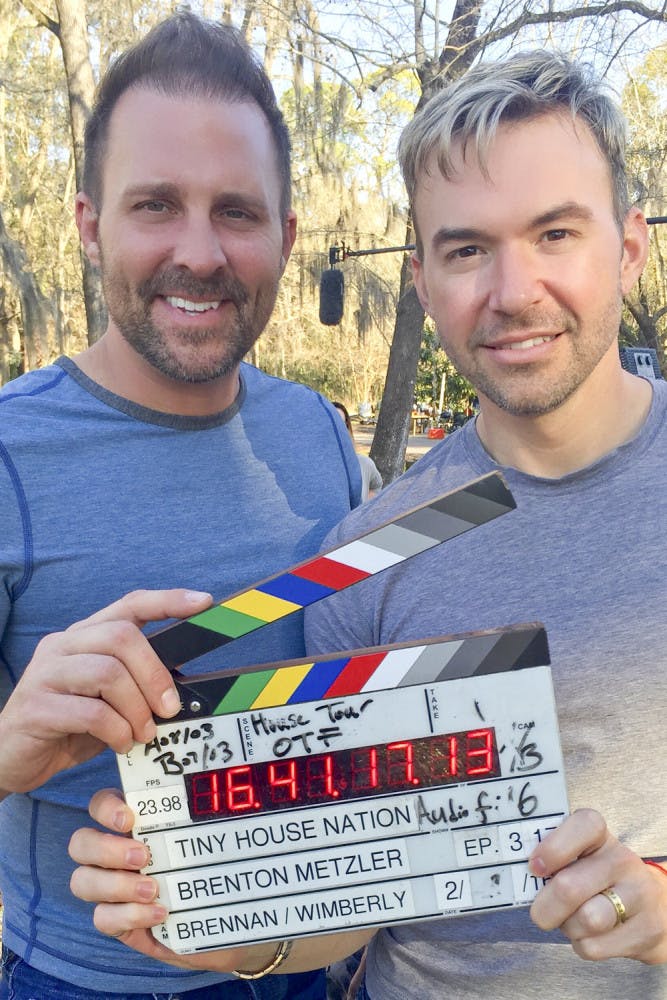 Danny Mckibbin, a UF alumnus and co-owner of several Gainesville businesses, poses for a photo with his husband and business co-owner, Lonie Carpenter, at their house. Their home was the set of an episode of “Tiny Houses,” where they filmed for seven days.