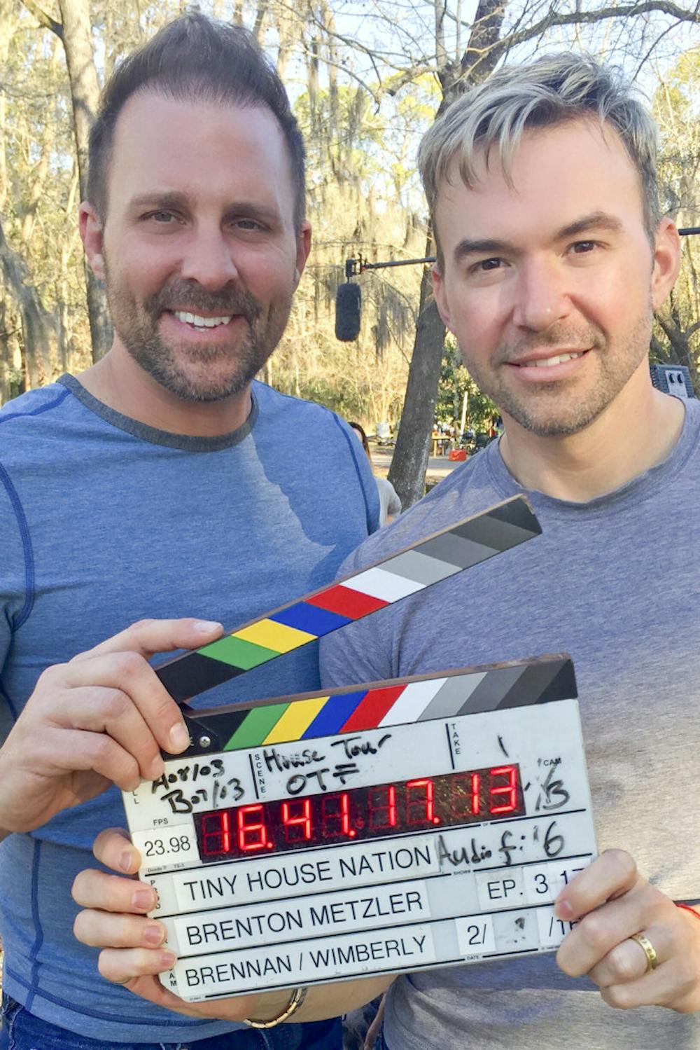 <p>Danny Mckibbin, a UF alumnus and co-owner of several Gainesville businesses, poses for a photo with his husband and business co-owner, Lonie Carpenter, at their house. Their home was the set of an episode of “Tiny Houses,” where they filmed for seven days.</p>