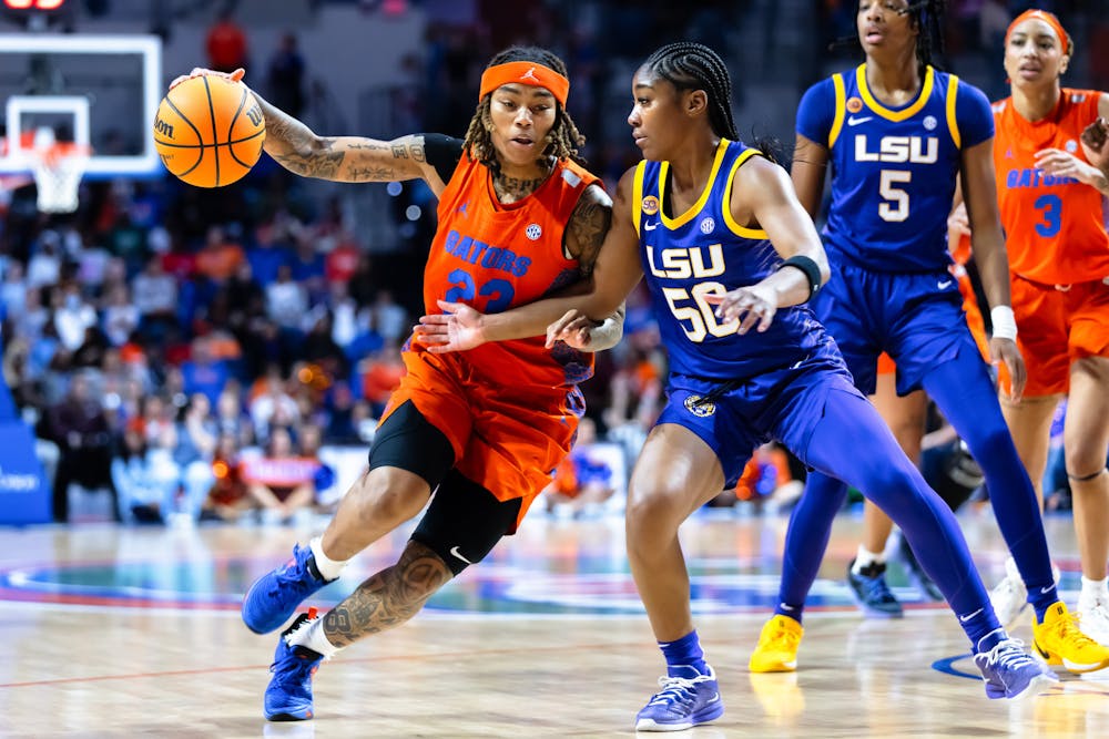 <p>UF Women’s Basketball player Liv McGill (23) collides with an LSU player during the game on Sunday, January 20, 2025.</p>