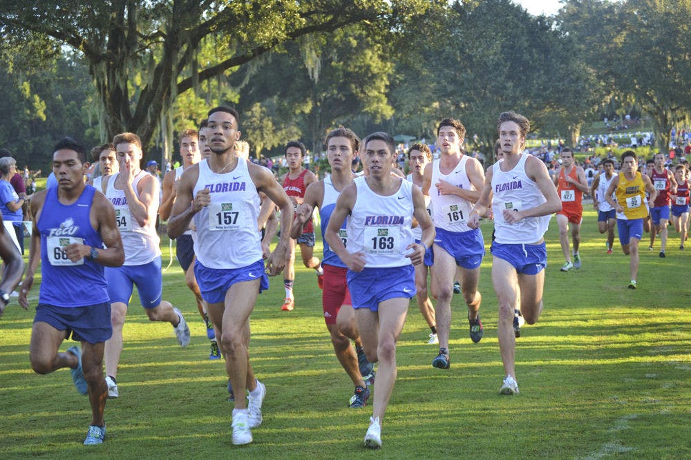 <p>UF's Eddie Garcia (157) leads the pack during the Mountain Dew Invitational on Sept. 19, 2015, at the Mark Bostick Golf Course.</p>