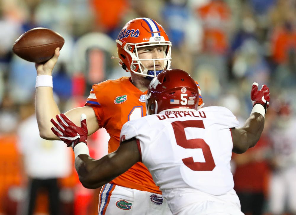 Gators quarterback Kyle Trask prepares to throw the football in Florida's game versus Arkansas at Ben Hill Griffin Stadium on Nov. 14, 2020.