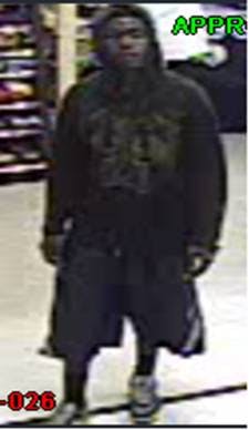 Security camera screenshot of suspect from Lil' Champ robbery