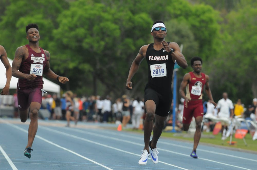 <p><span>Kunle Fasasi races in the 400-meter dash during the Florida Relays on April 1, 2016, at the Percy Beard Track.</span></p>