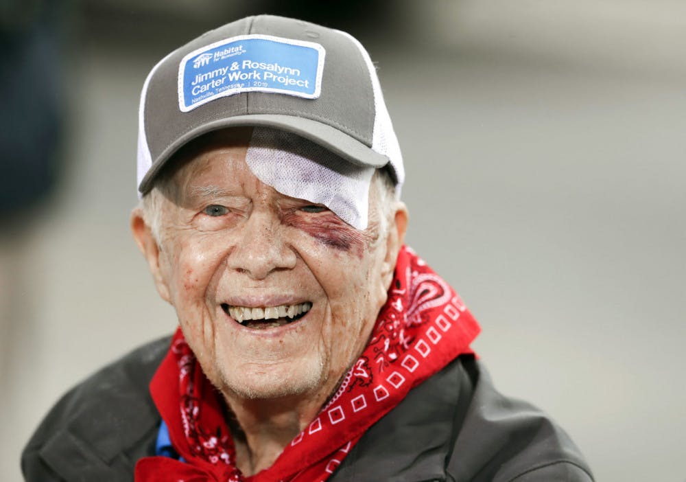 Former President Jimmy Carter answers questions during a news conference at a Habitat for Humanity project Monday, Oct. 7, 2019, in Nashville, Tenn. Carter fell at home on Sunday, requiring over a dozen stitches, but he did not let his injuries keep him from participating in his 36th building project with the nonprofit Christian housing organization. He turned 95 last Tuesday, becoming the first U.S. president to reach that milestone. (AP Photo/Mark Humphrey)