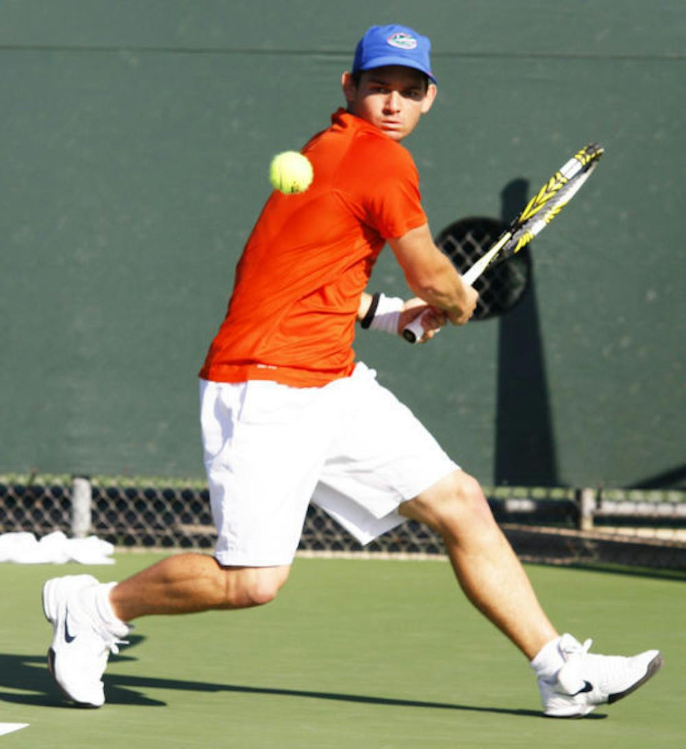 <p class="p1"><span class="s1">Senior Billy Federhofer prepares to backhand the ball during Florida’s 7-0 win against St. John’s on Jan. 26 at Linder Stadium. Federhofer dropped his last set 1-6 to end the Gators' 4-3 loss in the NCAA Tournament on Friday.</span></p>