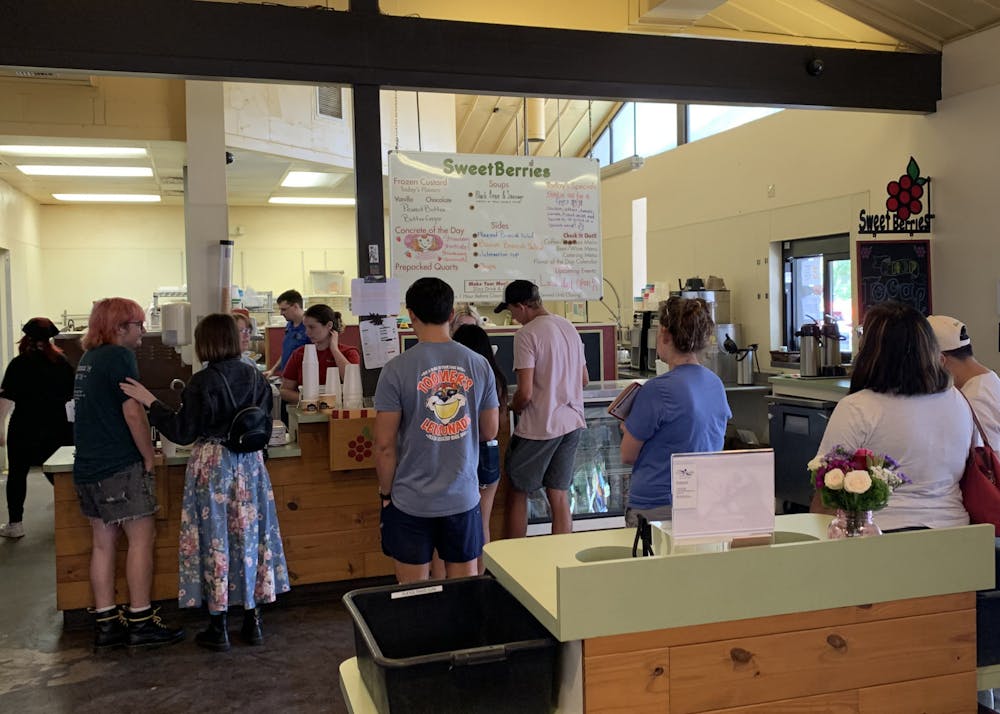 <p>Patrons enjoy their favorite menu items at Sweetberries Eatery and Frozen Custard for the last time before the shop relocates Sunday, July 17, 2022.</p><p></p>