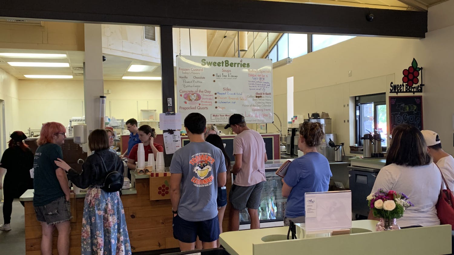 Patrons enjoy their favorite menu items at Sweetberries Eatery and Frozen Custard for the last time before the shop relocates Sunday, July 17, 2022.