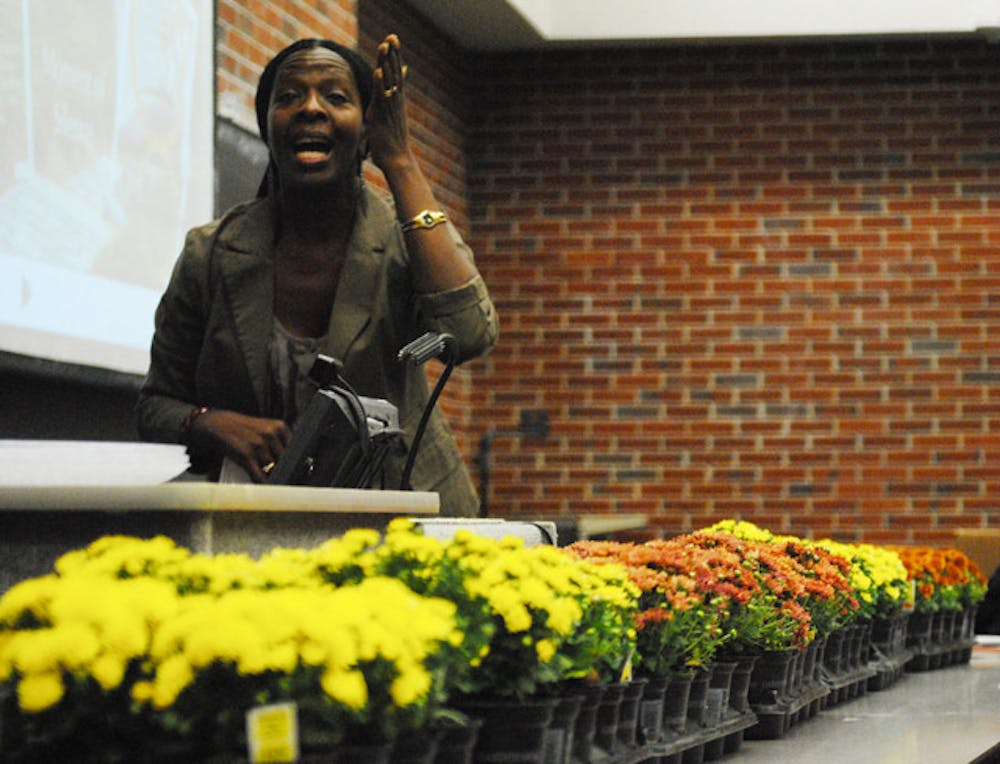 <p>Agnes Leslie, outreach director of UF's Center for African Studies, speaks to members of the African Student Union on Friday about how to honor Wangari Maathai and carry on her legacy.</p>