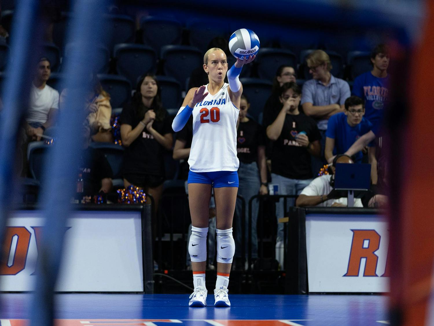 Florida Gators setter Taylor Parks (20) prepares to serve the ball during a volleyball match against the Baylor Bears at Exactech Arena at the Stephen C. O'Connell Center on Sunday, September 14, 2024.