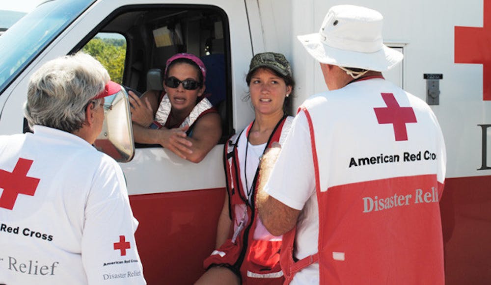 <p>UF students Molly Jansen and Maria Fitzgerald, who just started internships with the local Red Cross chapter, were tapped to help with Hurricane Irene efforts. They drove a truck to Middletown, N.Y., to dis- tribute meals to people who are cleaning up after a flood.</p>