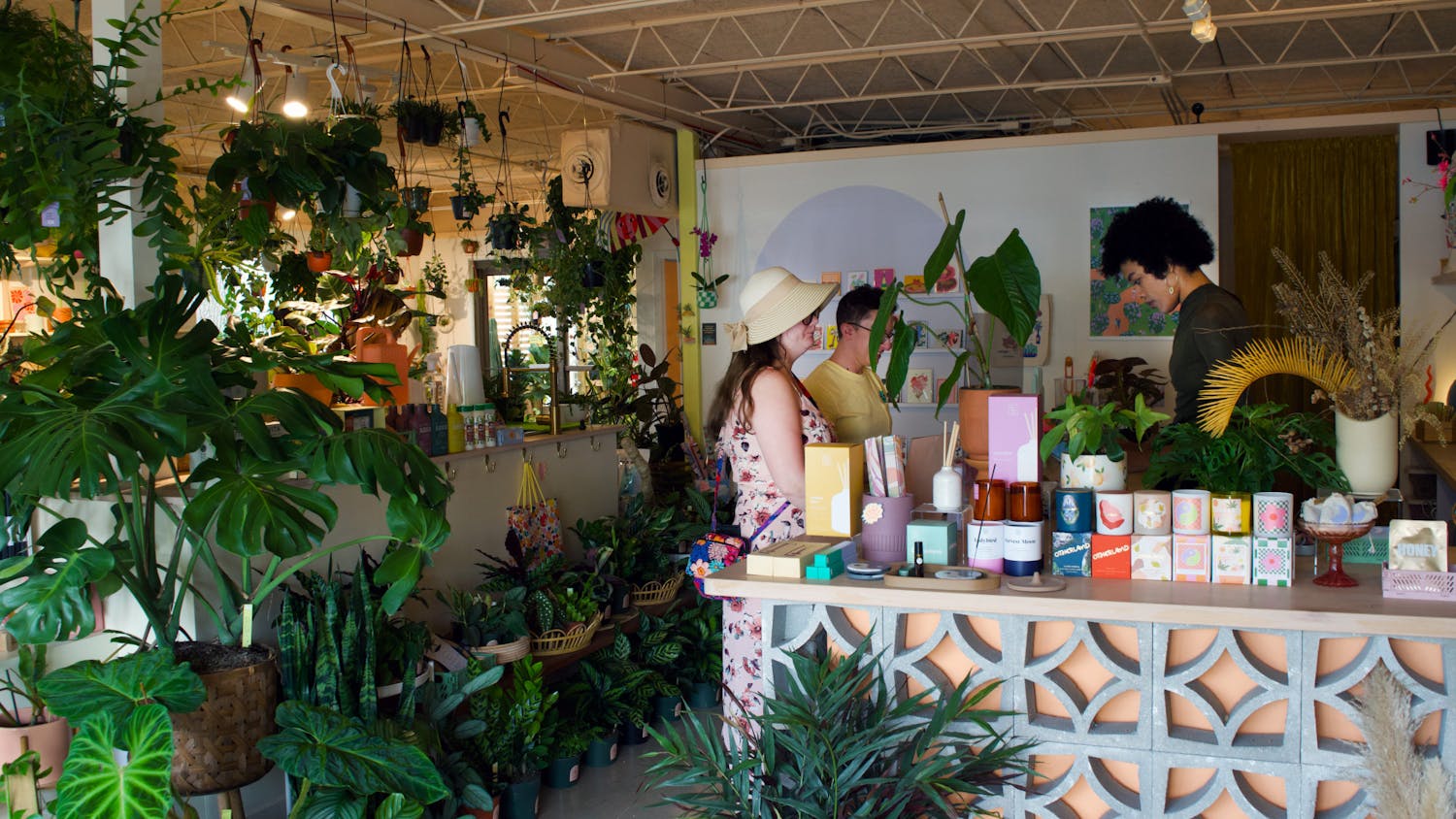 Customers browse the vast plant selection at Serpentine Plants + Provisions Friday, Feb. 17, 2023.