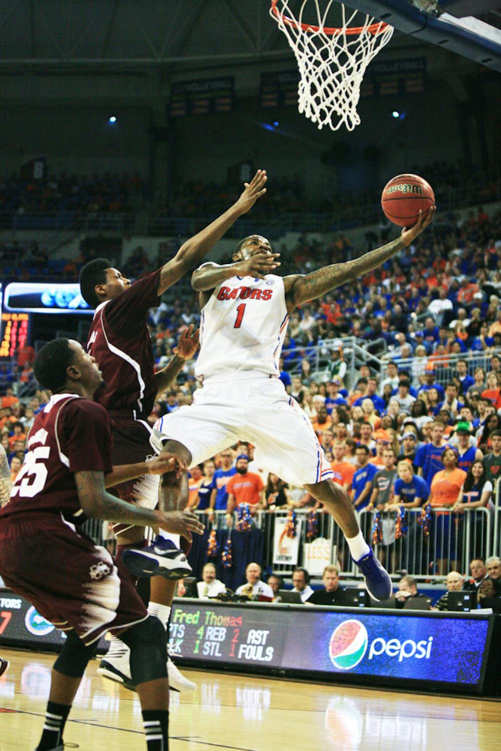 <p><span>Kenny Boynton (1) attempts a shot during Florida’s 83-58 win against Mississippi State on Saturday.</span></p>
<div><span><br /></span></div>