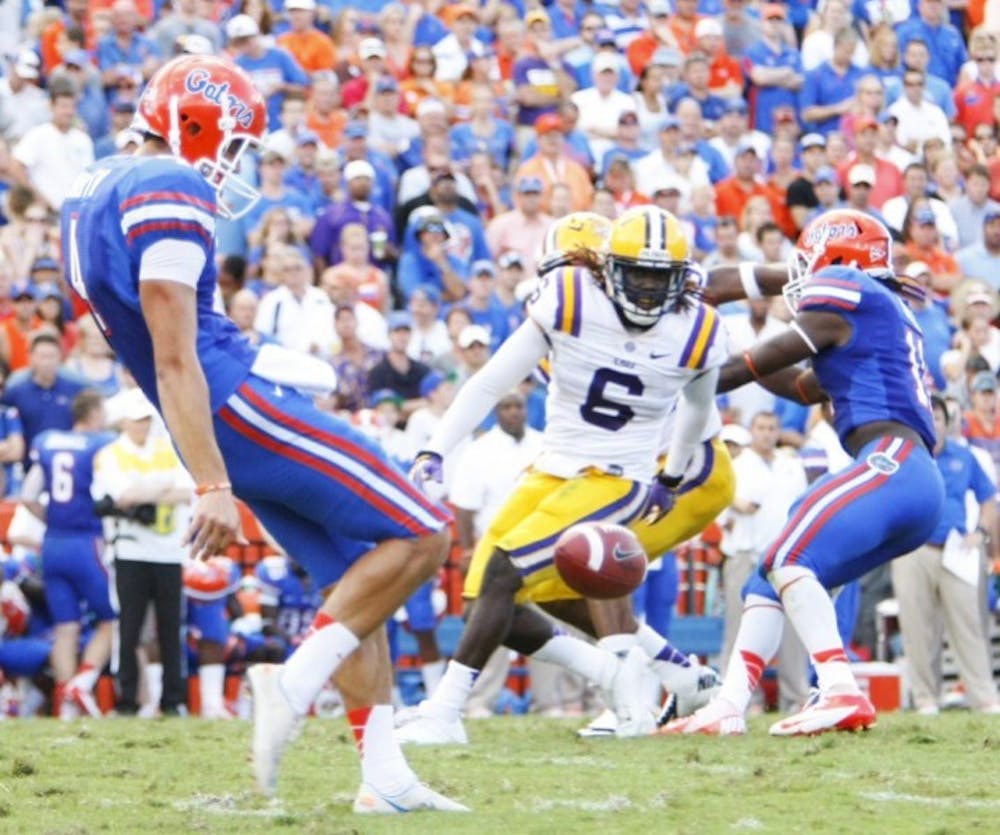 <p>Sophomore Kyle Christy (4) punts in Florida's 14-6 victory against LSU on Saturday in Ben Hill Griffin Stadium. Christy helped UF win the field position battle by pinning LSU inside their 10-yard line three times.</p>