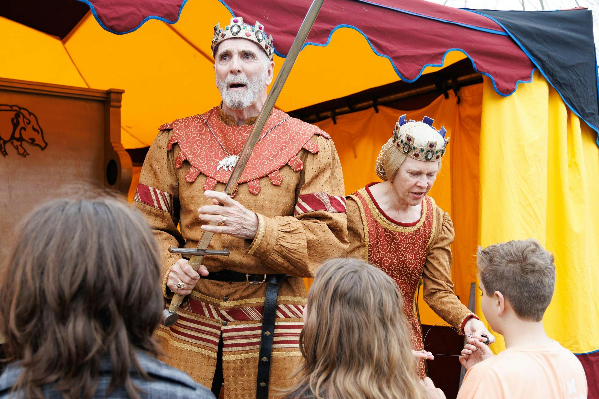 Michael Huey and Fontaine Huey knight attendees of the Hoggetown Medieval Faire at Depot Park, Sunday, Jan. 25, 2026.