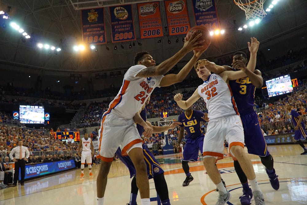 <p>UF forward Justin Leon corrals a rebound during Florida’s 68-62 win over LSU on Jan. 9, 2016, in the O’Connell Center.</p>