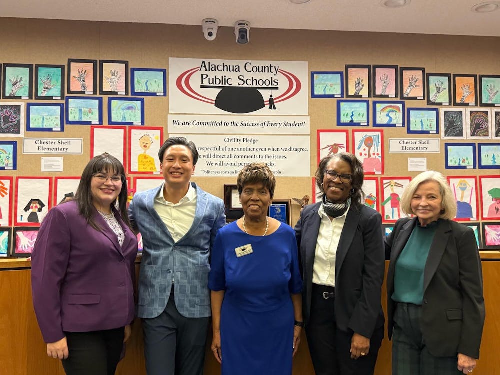 <p>Kay Abbitt, far right, pictured with the rest of the Alachua County School Board Nov. 19</p>