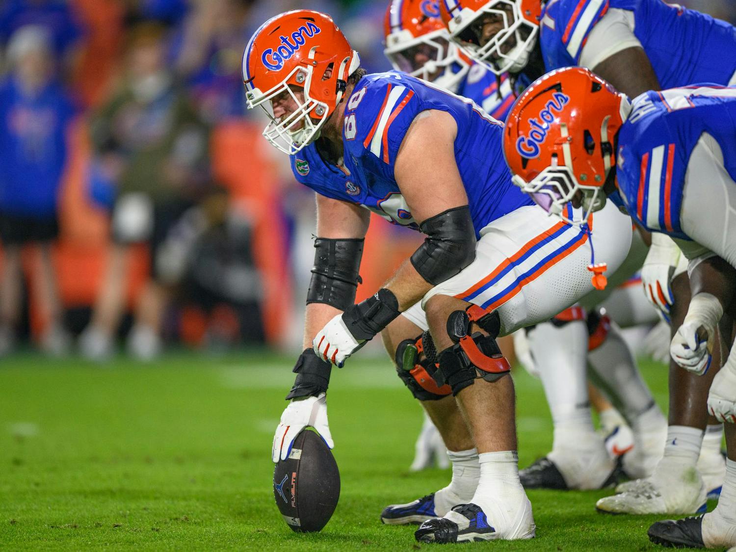 Florida offensive lineman Jake Slaughter (66) prepares to snap the ball during the second half of an NCAA college football game against Tennessee, Saturday, Nov. 22, 2025, in Gainesville, Fla.